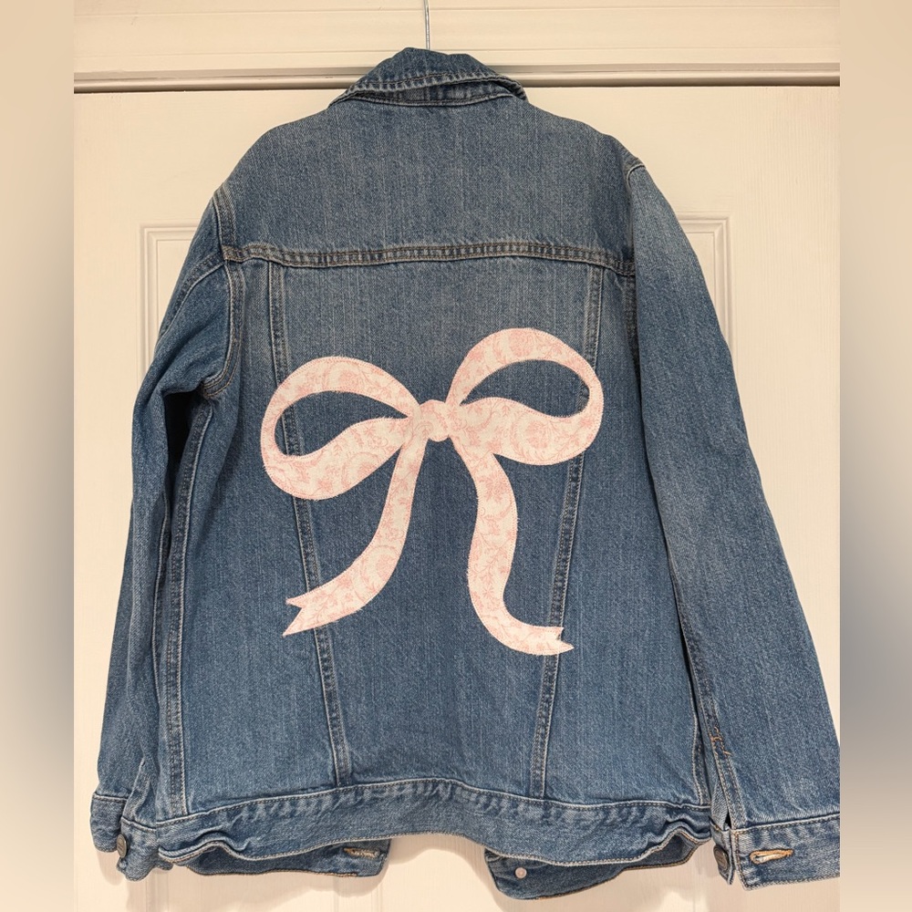 Pink bow Jean jacket size 10-12 oversized girls
